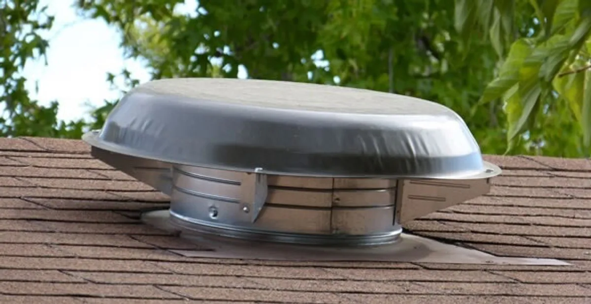 attic fan installation services with low-profile roof ventilation unit in Waltham, MA