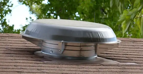 attic fan installation services with low-profile roof ventilation unit in Waltham, MA