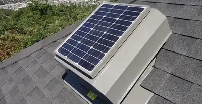 attic fan installation services with energy-efficient roof-mounted ventilation system in Waltham, MA