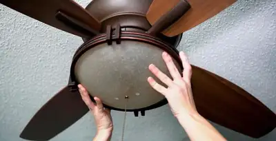 Ceiling fan repair and reinstallation on ceiling mount in Waltham, MA