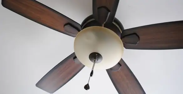 Fully installed ceiling fan with balanced blades and light fixture in Waltham, MA