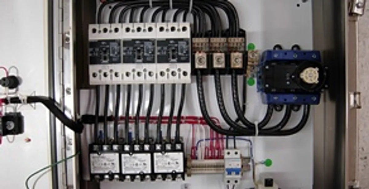 Electrical panel installation with organized circuit breakers and wiring in Waltham, MA