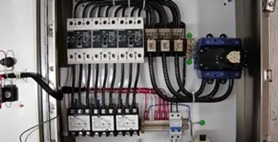Electrical panel installation with organized circuit breakers and wiring in Waltham, MA