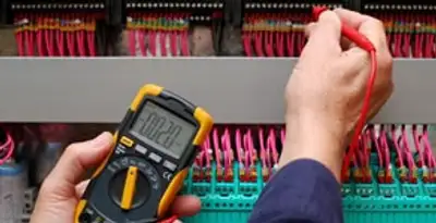 electrical service showing professional testing and troubleshooting of electrical panel by licensed electricians in Waltham, MA