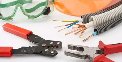 Electrical wiring repair with professional tools and safety equipment in Weston, MA