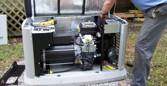 generator installation service showing technician connecting and configuring generator components in Waltham, MA