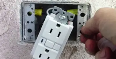 gfci circuits service showing installation of a ground fault circuit interrupter outlet by licensed electricians in Waltham, MA
