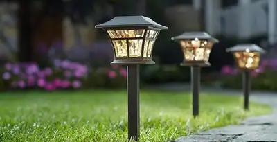 landscape lighting installation services with professionally installed pathway lights in Waltham, MA