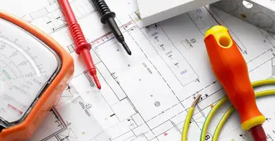 licensed electrician planning and testing electrical systems using professional tools in Waltham, MA