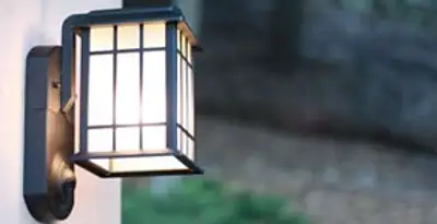 security light installation services with professionally mounted exterior wall light in Waltham, MA