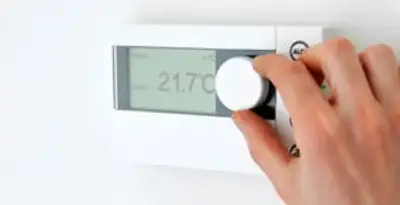 Thermostat installation service with professional adjusting temperature control in Waltham, MA